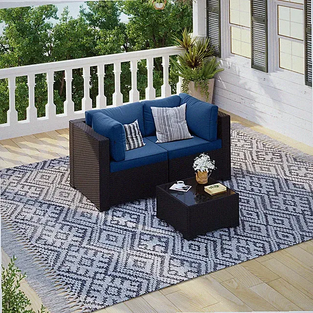 3-Piece Black Rattan Sofa Set Navy Blue Cushions Coffee Table