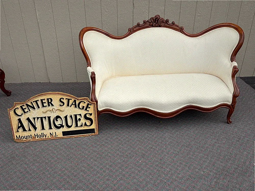 67764 Victorian Carved Walnut Sofa with Cream Upholstery