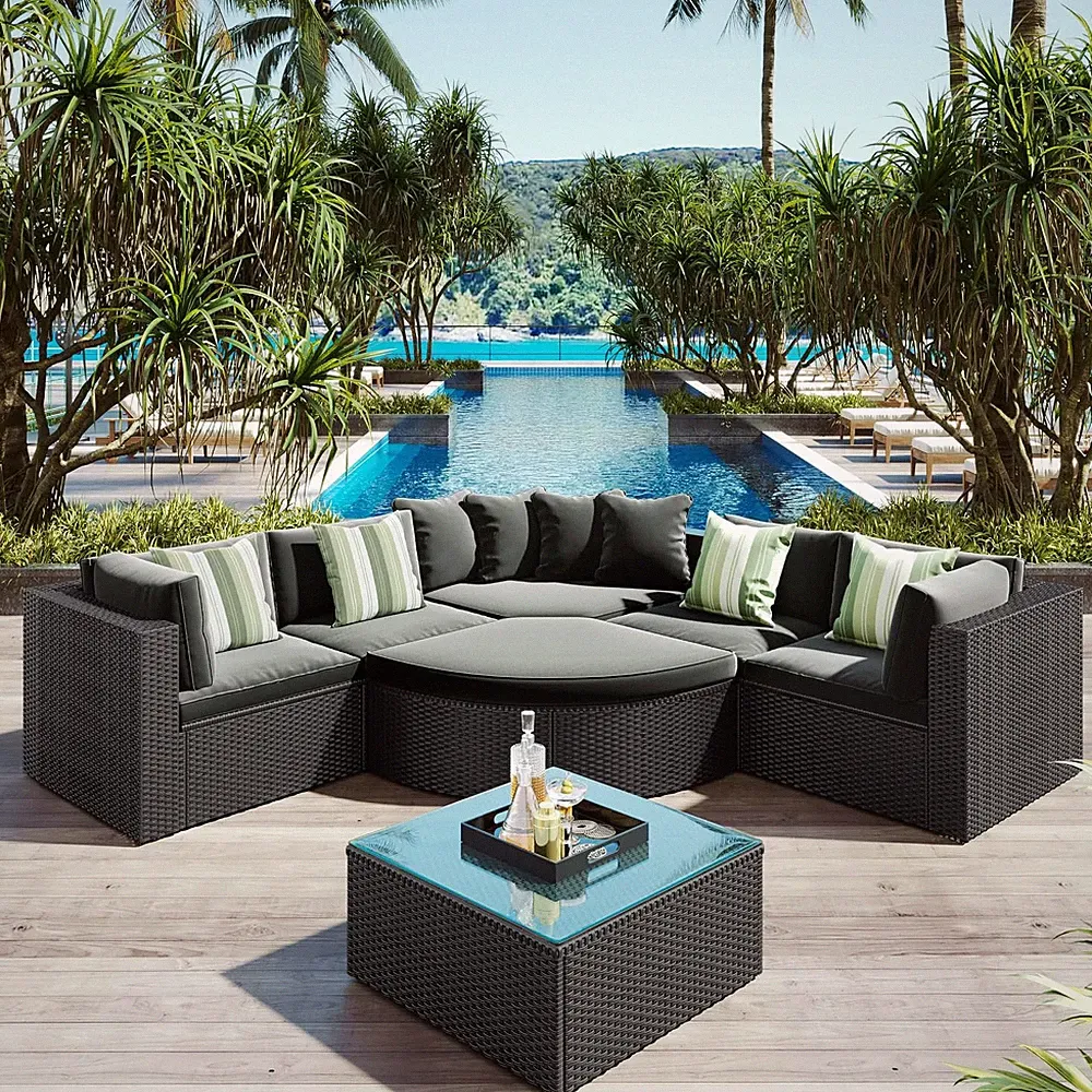 7-Piece Outdoor Wicker Sofa Set with Striped Green Pillows, Black PE Rattan Conv