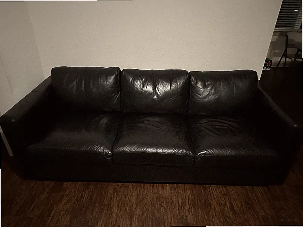 Black leather sofa, used for two years, relatively new. bought at ikea.