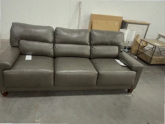 Brand new la z boy pewter sofa. Small hole in the back