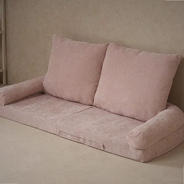 Convertible Fold-Out Single Sofa Bed Pink the Left Part of the Complete Product