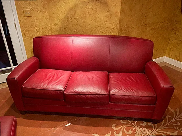 Couches - 2 wine colored leather sofas, slightly used, 78 in, simply elegant