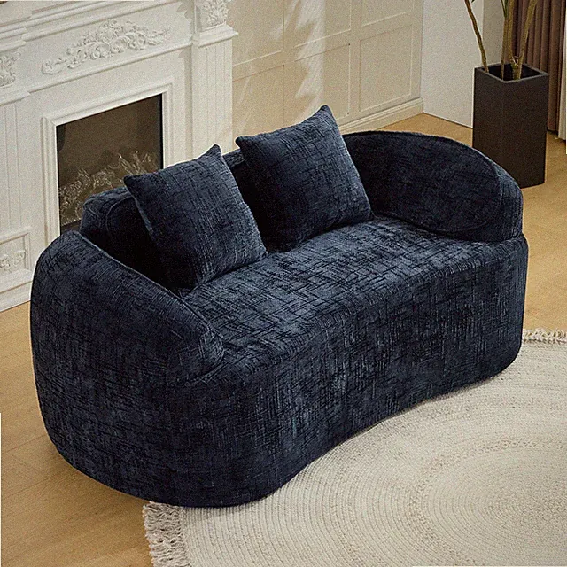 Dark Blue curved two - person compress sofa. It has armrests on both sides, com