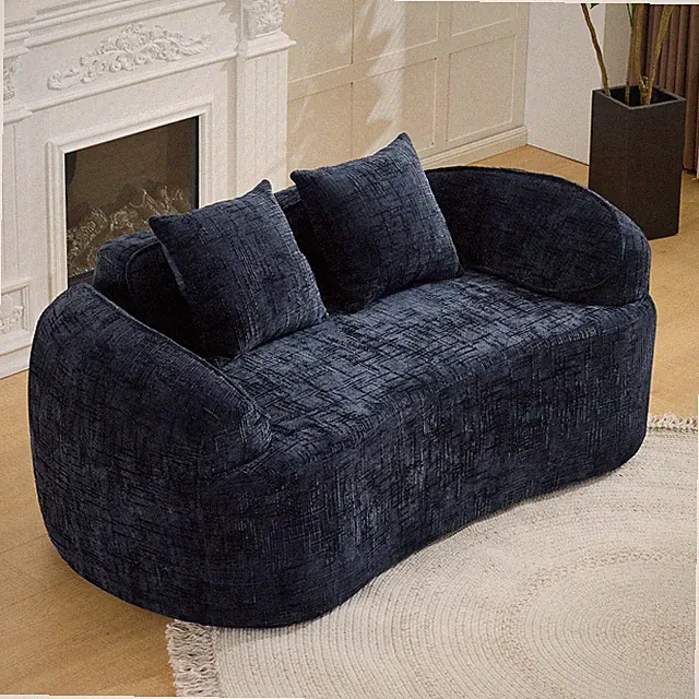 Dark Blue curved two - person compress sofa. It has armrests on both sides, com