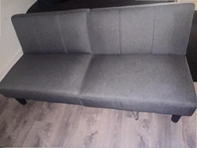 Dark grey futon sofa bed slightly used