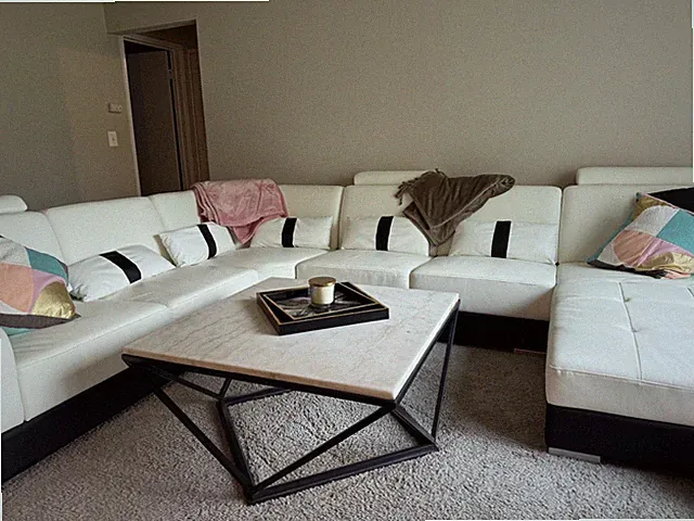 Genuine leather sofa sectional, minimal use, no wear or tear , moving sale