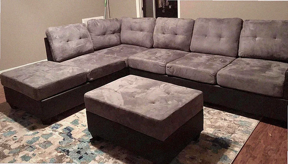 Grey reversible microfiber sectional with drop down cup holders and storage otto