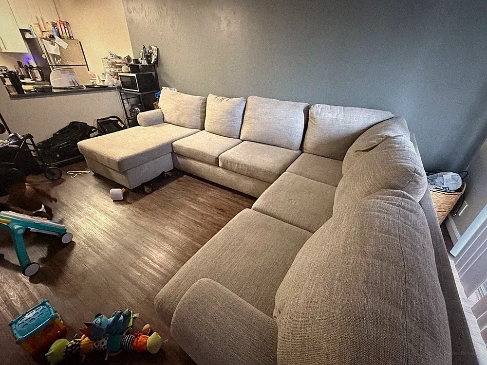 Grey Sectional with Queen size pull out bed - living spaces