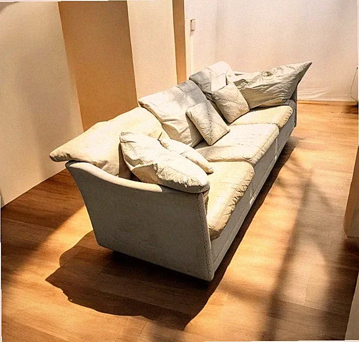Indulge in the understated luxury of Scandinavian Dansk leather sofa.