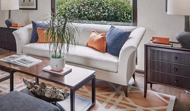 Ivory Sofa with Flared Arms 86’' Wide, used for staging, in good condition