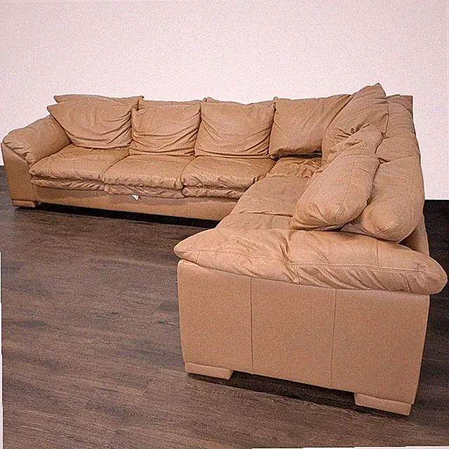 Large Tan Leather Sectional Sofa with Cushioned Seats
