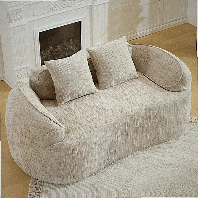 Light khaki curved two - person compress sofa. It has armrests on both sides, c