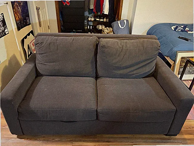 Lightly Used Gray Sofa w/ Pull-Out Mattress