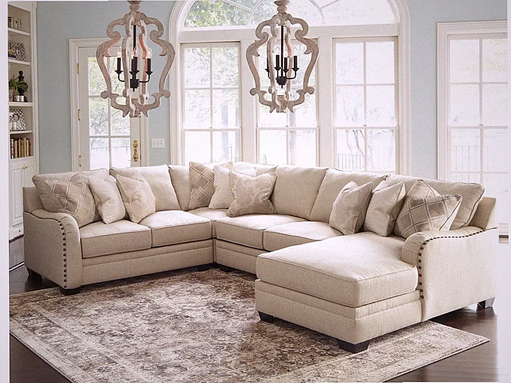 Luxora 4-Piece Sectional with Chaise and Ottoman $3,000 at Ashley Furniture.