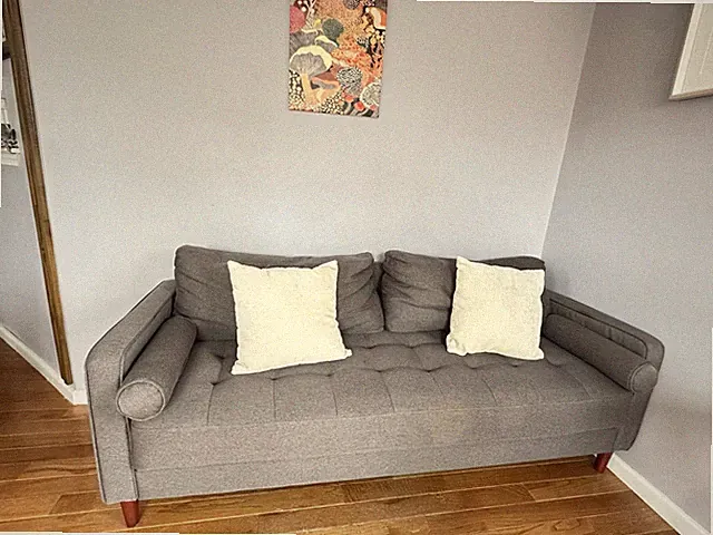 Modern Gray Tufted Sofa with Bolster Pillows – Excellent Condition