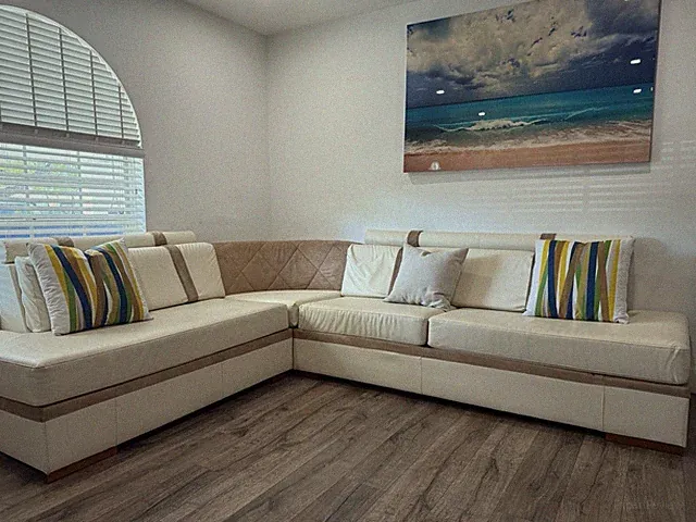 Modern L-Shaped Sectional Sofa w/ Pull-Out Bed – Leather-Look, Clean Condition