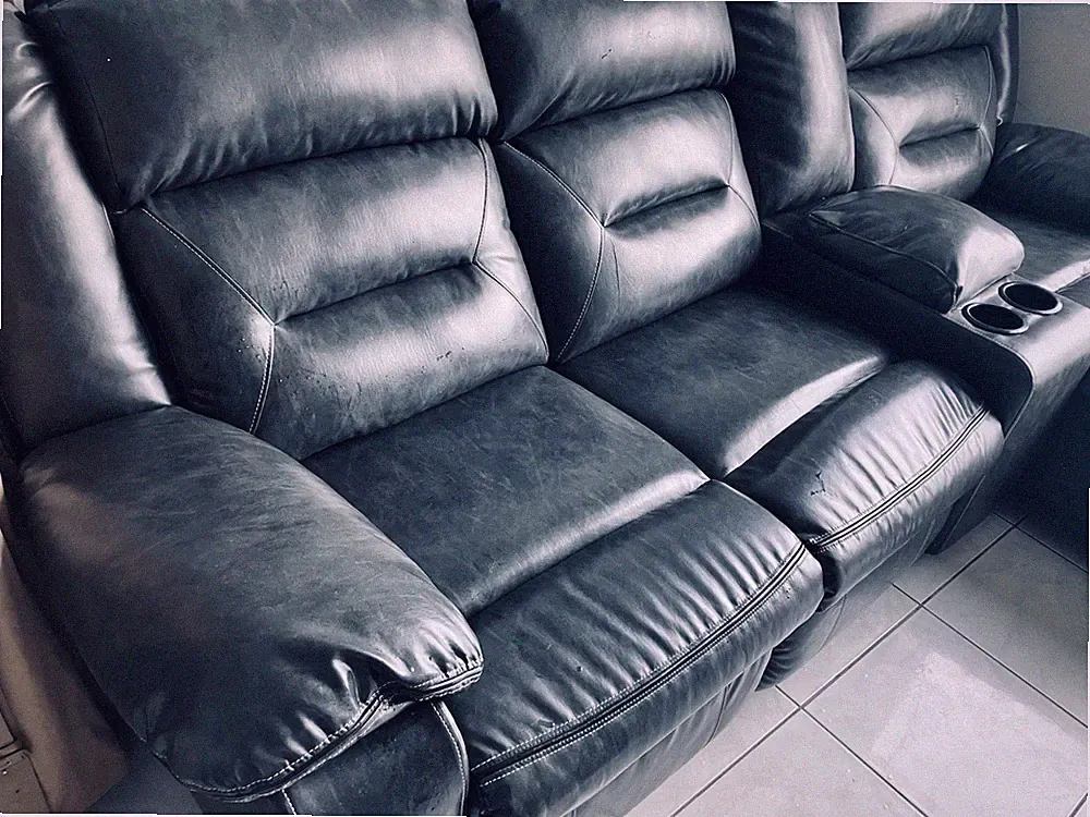 Power Reclining Sectional Sofa with Cup Holders and Console by Ashley Furniture