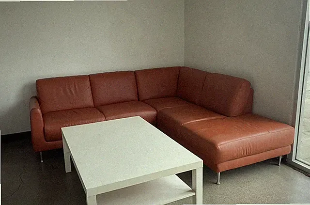 Rust Orange IKEA Sectional Couch with Removable Legs and Chaise Lounge