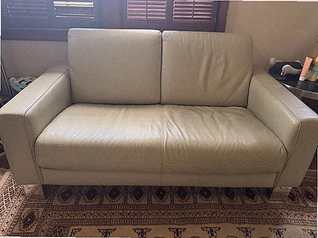 Scandinavian living room set - USED. Leather, one of a kind. Well loved.