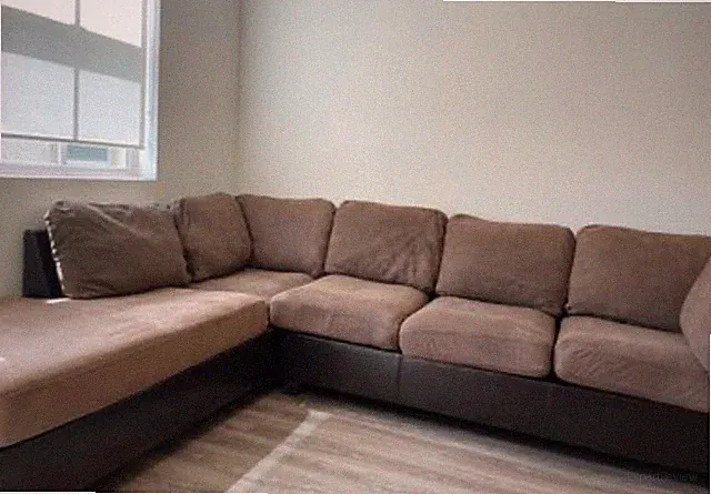 sectional sofa set, 10 feet * 10 feet. Beige color seats and cushions.