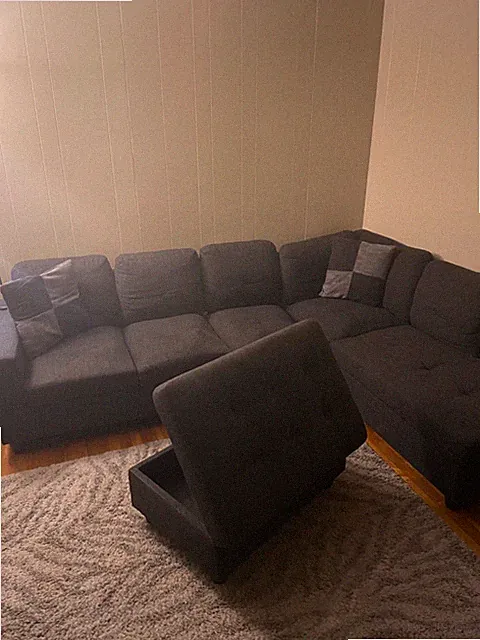 sectional sofa, used with opening ottoman and 2 dec. Pillows , one protrusion