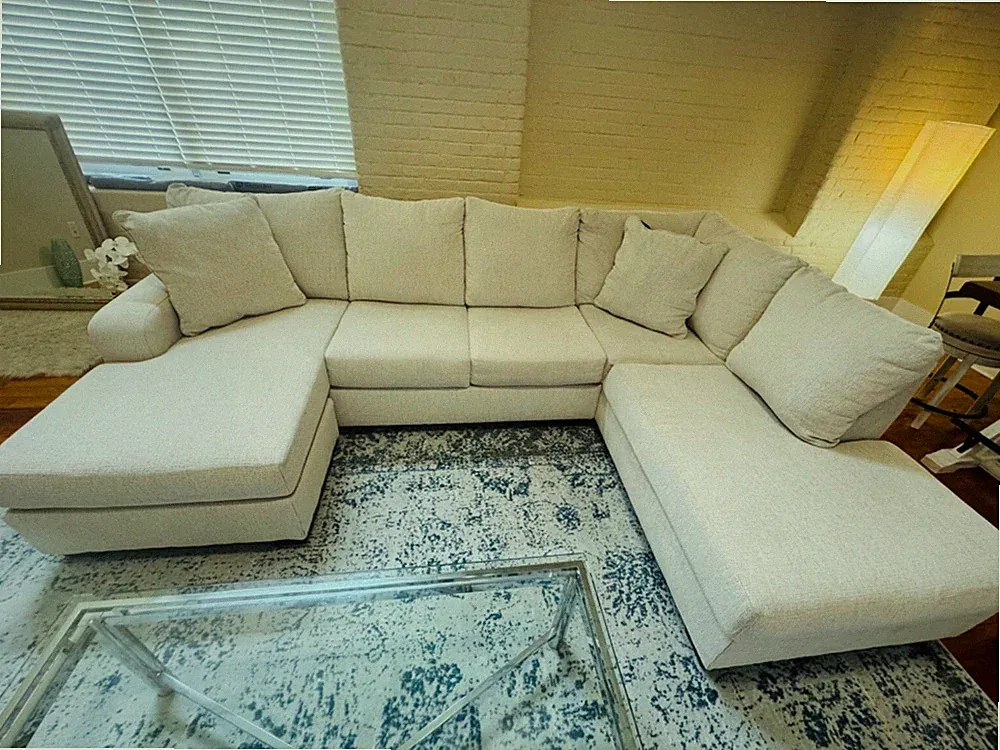 Snow Color 2 piece Sectional. Include Two Pillows Depth: 87" Weight: 292lbs