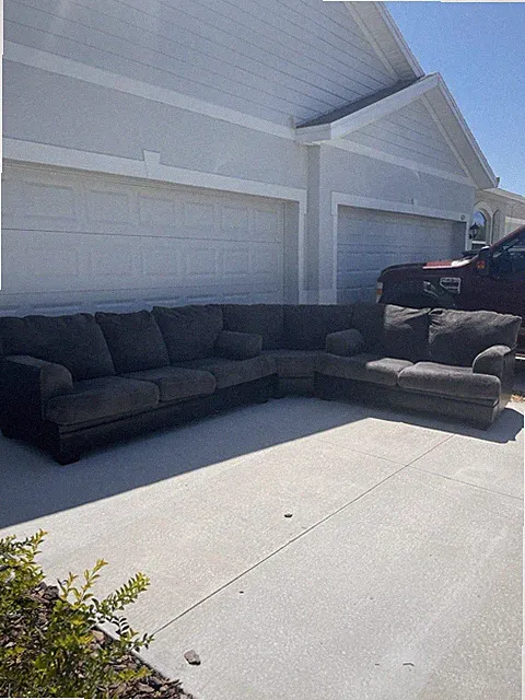 Two-Tone Sectional with Plush Fabric Seating & Leather Base