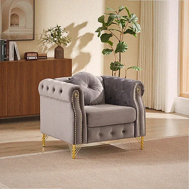 Velvet Chesterfield sofa w/round pillows,featuring copper stud detailing and tu