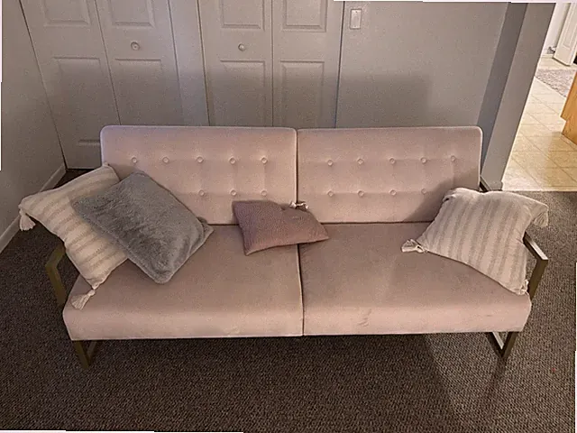 Velvet Futon Sofa Bed light pink. gold metal arm rests