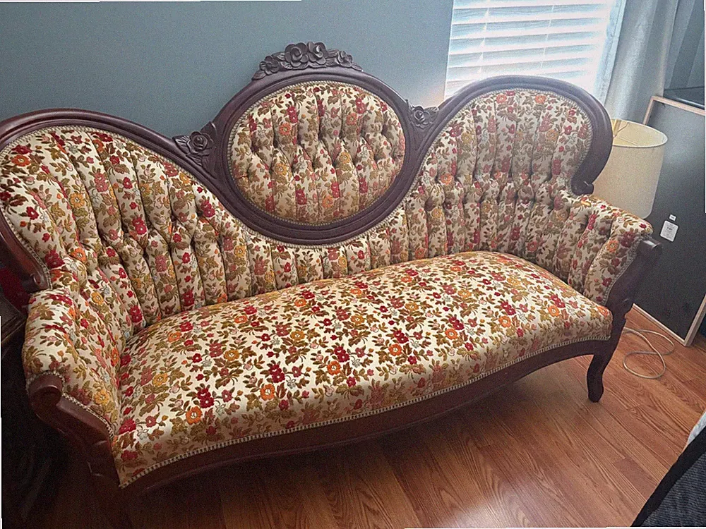 Victorian style sofa - gently used. Floral pattern.