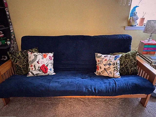 Wood full size futon couch/sleeper. Great condition with minimal wear and tear