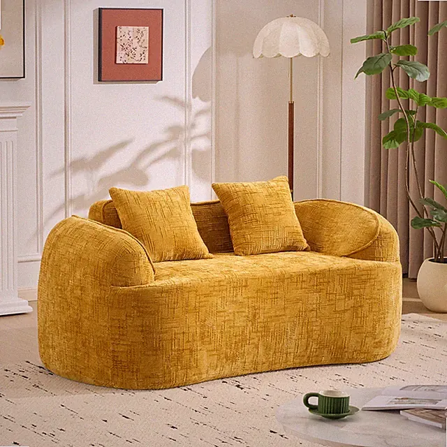 Yellow curved two - person compress sofa. It has armrests on both sides, come