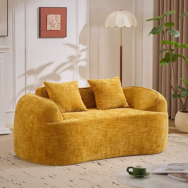 Yellow curved two - person compress sofa. It has armrests on both sides, comes